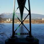 Vertical pan of the Lion's Gate Bridge taken from underneath