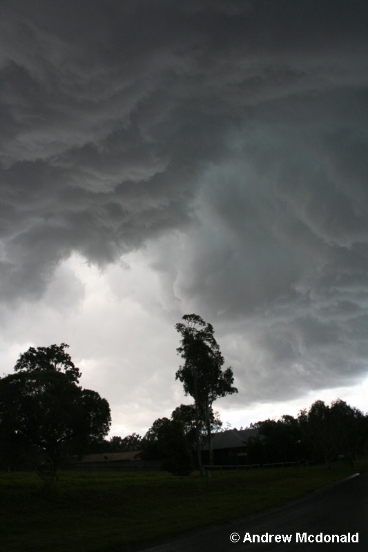 I moved down the road about 1km (ENE).  Still rotating.  Precip just started at this point - big drops.