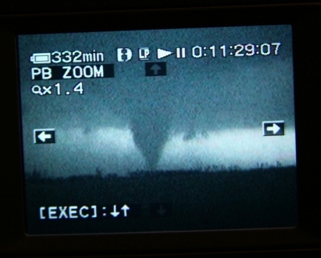 Stove pipe tornado lit up by lightning on dusk near Macksville, Ks.  Note:  Video capture only. 