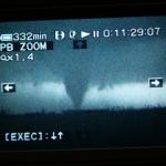 Stove pipe tornado lit up by lightning on dusk near Macksville, Ks.  Note:  Video capture only. 