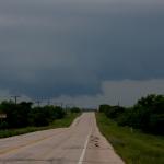 The wall cloud takes another trip across the tree tops.  Near Throckmorton, Tx.