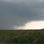 Looking SE towards a tennis-ball hail producing, tornado warned supercell near Freer, Texas.